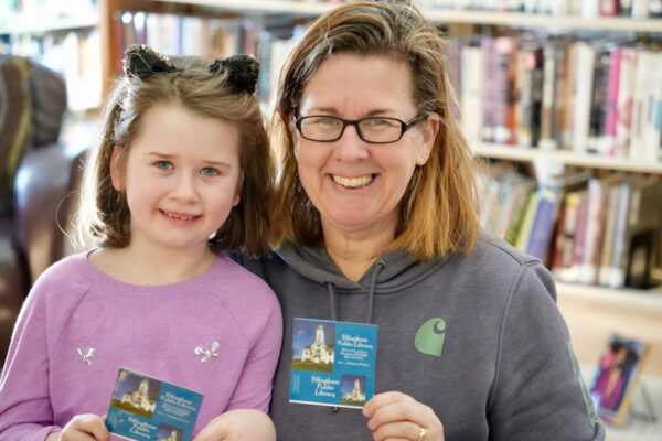 EPL Community - Mom and daughter showing their library cards